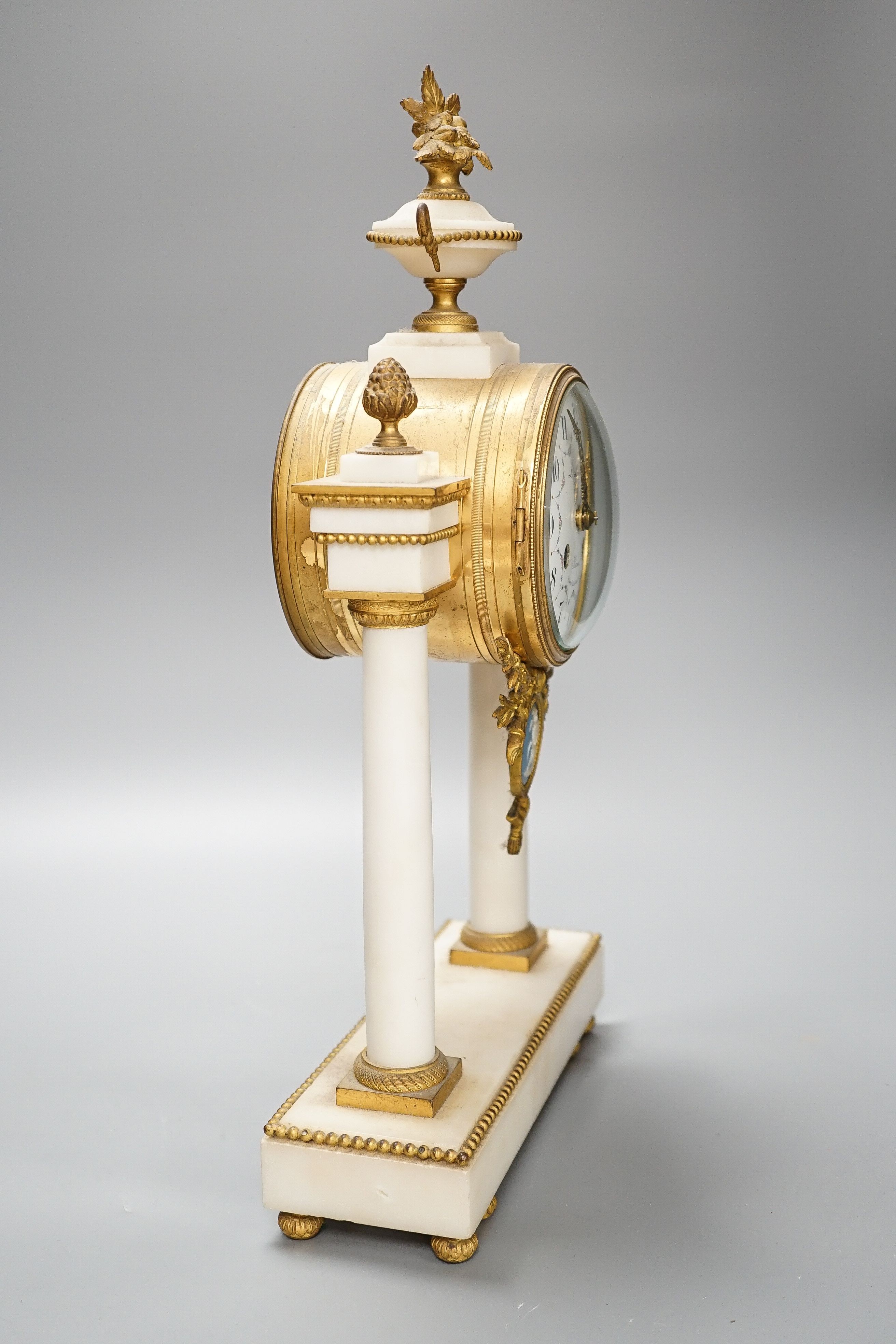 L. Leroy & Cie, Paris. A French ormolu mounted white marble portico clock width 24cm depth 8cm height 44cm high